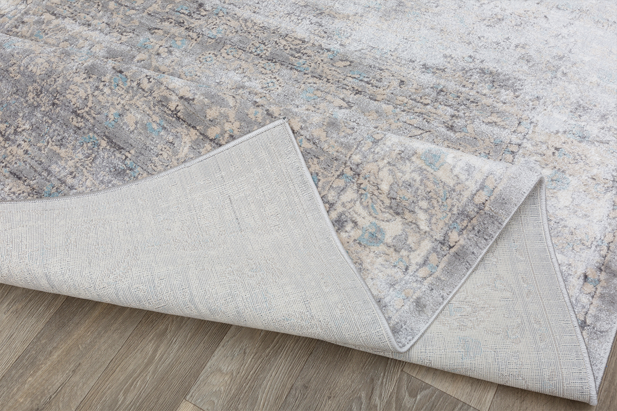 Folded underside of a bespoke rug
