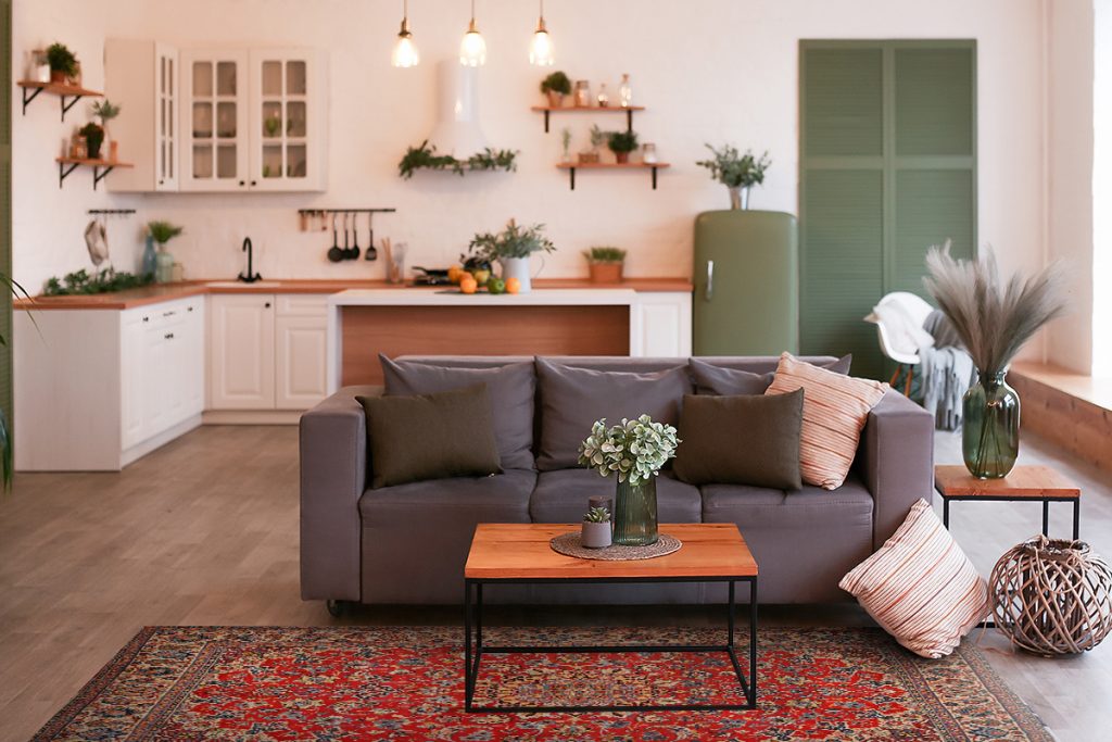 Rugmaker_Blog-Piece-SideImages_Modern open plan kitchen with living area and big window.
