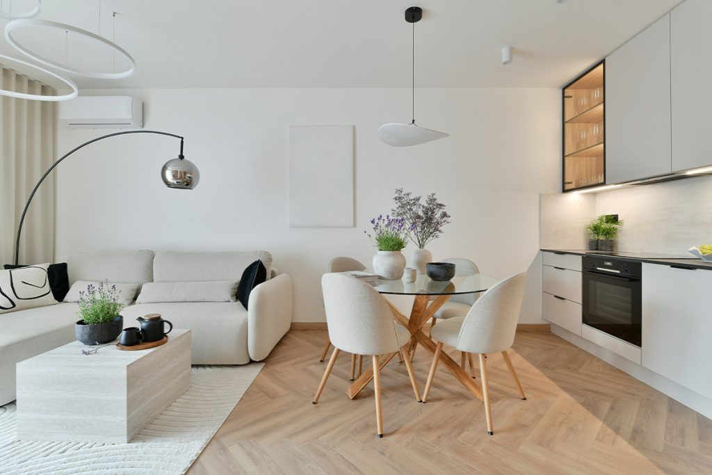 Rugmaker_Blog-Piece-SideImages_Photo of Modern Open-Plan Living Room with Japandi Style, White Sofa, Led Ring Chandelier