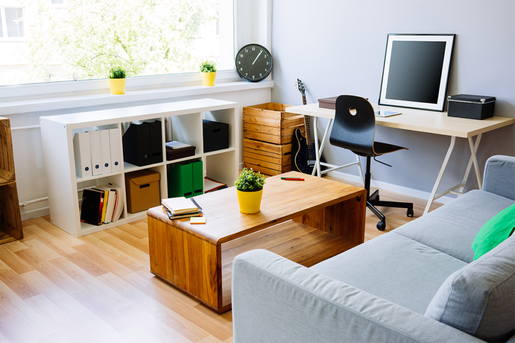 Modern-room,-home-office-interior.-Room-with-sofa,-desk,-chair,-small-table-and-other-fur