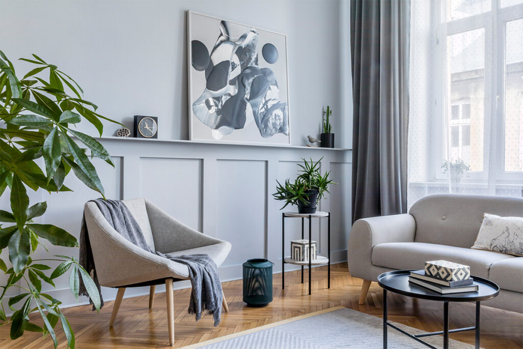 Rugmaker_Blog-Piece-SideImages_Stylish scandinavian home interior of living room with design gray sofa