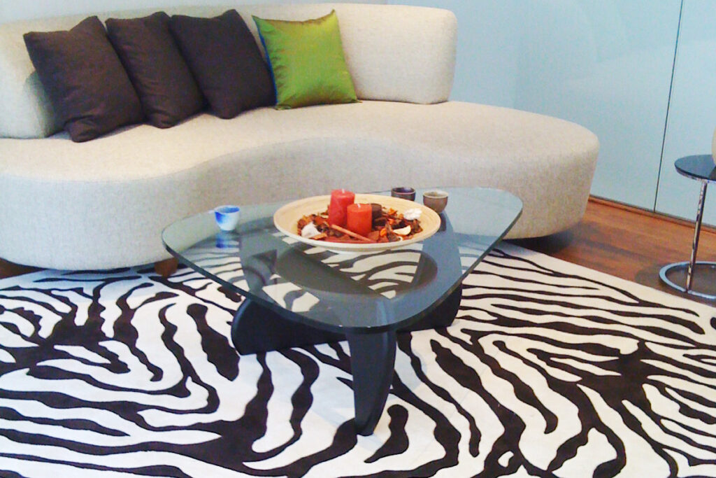 Rugmaker_Blog-Piece-SideImages_zebra patterned rug in a living room