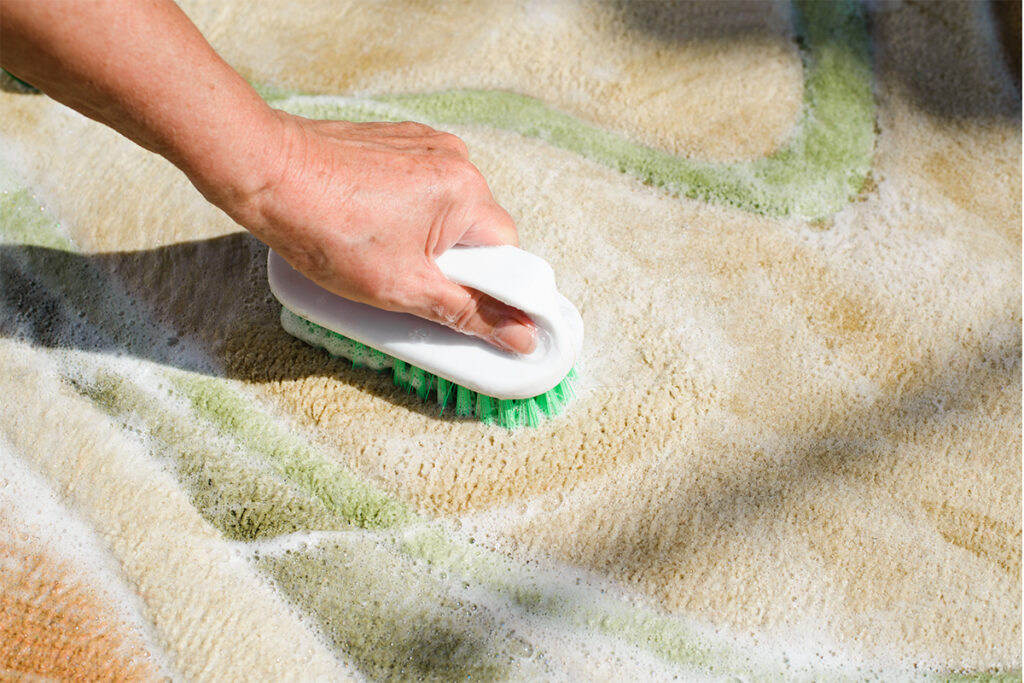 Rugmaker_Blog-Piece-SideImages_Carpet cleaning with brush and detergent foam