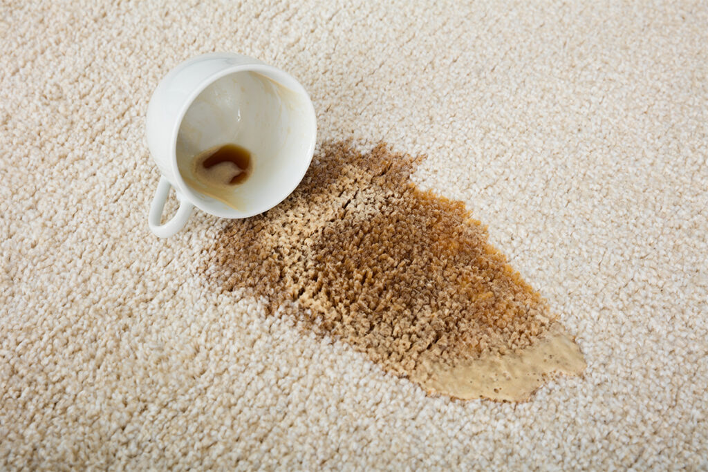 Rugmaker_Blog-Piece-SideImages_Close-up Of Coffee Spilling From Cup On Carpet