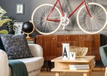 Rugmaker_Blog-Piece_Vintage unique living room interior with white comfortable sofa with cushions and blanket