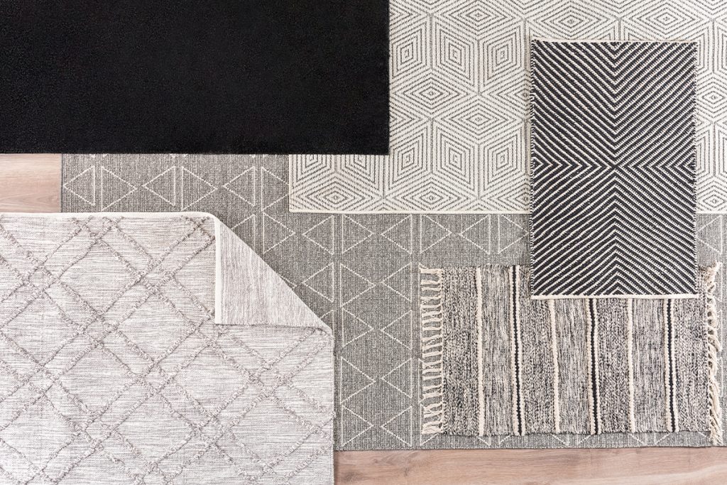 Top View of Diverse Area Rug Assortment_ Neutral Tones Fabric Texture to Geometric Monochromatic Patterns, Plush Texture