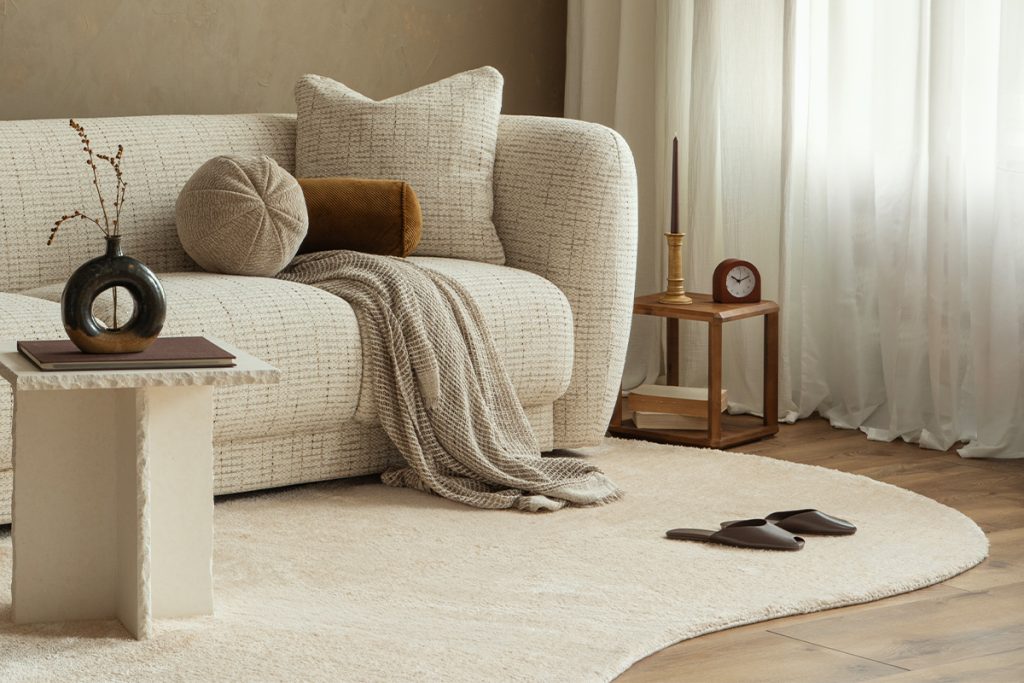 Rugmaker_Blog-Piece_Living Room Interior with Stylish Furniture and Earthy Tones