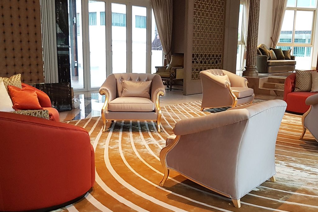 Rugmaker_Blog-Piece_Interior of modern living room with cozy sofa and seats